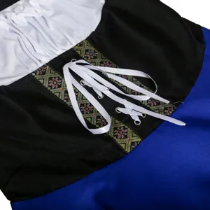 Detailed close-up of traditional Oktoberfest dirndl dress featuring lace-up bodice and trim.