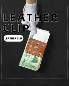 Detailed view of PU leather golf money clip with metal skull and magnetic closure.