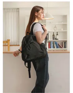 Dunkelgrauer Damen Rucksack mit Kordelzug, lässige Pendler Schultasche mit Reißverschluss.