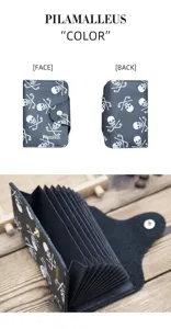 Tarjetero de acordeón de cuero negro con patrón de calaveras y palos de golf.