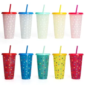 Closeup of colorful plastic cold color changing cups with star patterns and matching straws.