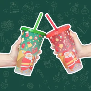 Close-up detail of Christmas color-changing plastic straw cups in red and green festive set.