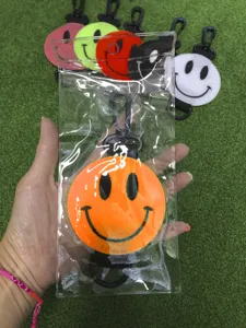 Oranje smiley gezicht golfbal klittenband haak lus sleutelhanger talhangend praktisch