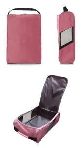 Detailansicht der pinken Golfschuhtasche mit atmungsaktivem Mesh und robustem Griff.