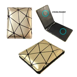 Detailansicht des goldenen geometrischen Dreiecksmuster magnetischen Geldklammer Portemonnaies.