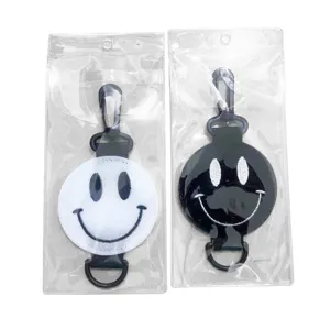 Koreaanse stijl smiley gezicht golfbalhouder met handige dubbelzijdige klittenband riem.