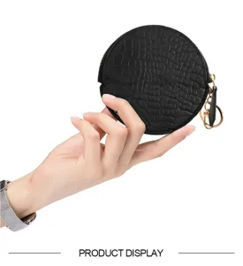 Black round crocodile pattern leather coin purse with metal zipper and key ring detail.