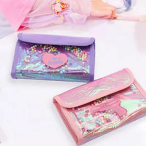 Detail view of the colorful laser small purse, showing transparent shaker pocket and cute design.