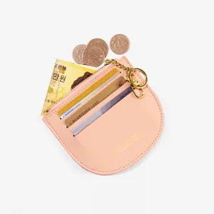Minimalistischer pinker Mini-Leder-Kartenhalter und Geldbörse mit Reißverschluss und Schlüsselring.