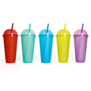 Colorful plastic cold cups with dome lids and matching straws, glitter sparkle design.