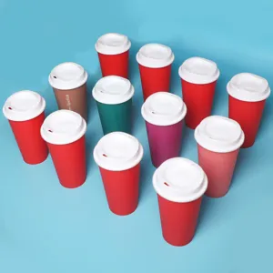 Detailed view of colorful reusable plastic coffee cups with white lids, perfect for daily use.