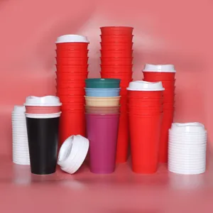 Detailed view of colorful 16oz plastic coffee travel cups with lids in assorted stacked styles.