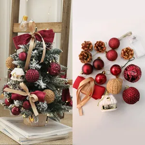 Mini Christmas tree DIY accessory kit with decorative balls, pine cones and lights.