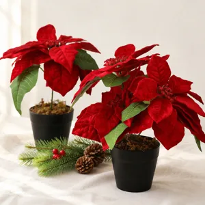 Artificial red poinsettia potted plant for Christmas indoor home decor and holiday arrangement
