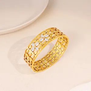 Stainless steel gold wide hollow flower crystal bangle detail, exquisite fashion jewelry.