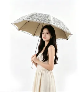 Elegant double layer embroidered lace sun umbrella with solid wood handle and uv protection.