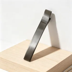 Minimalist metal hair clip in gunmetal gray, elegant large barrette for modern chic everyday hairstyles.