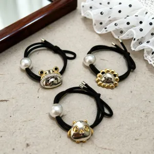 Pearl elastic hair tie with cute animal metal charm for women, stylish detailed daily hair accessory.