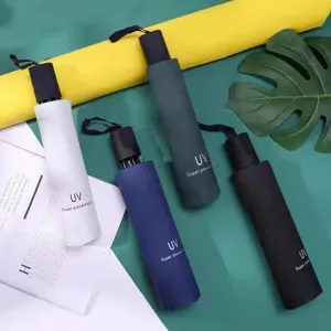 Compact black glue UV sun umbrella, portable three-fold folding umbrella for outdoor rain shade.