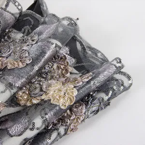 Elegant double layer lace embroidered folding sun umbrella with delicate sequins and UV protection.