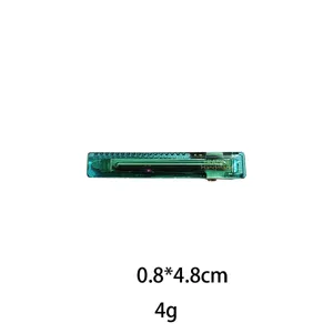 Green transparent resin side hair clip detail view, elegant minimalist barrette for everyday wear.