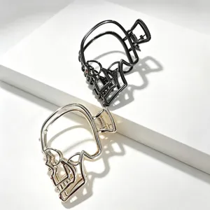Gothic metal skull hair claw clip for women, stylish back head hair styling accessories.