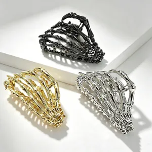 Gothic skeleton hand hair claw clips in black gold and silver, detailed metal metal hair accessories