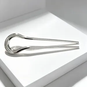 Minimalist silver alloy U-shaped hair pin, elegant curved hair fork for daily styling.