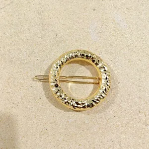 Elegante fermacapelli tondo geometrico irregolare in metallo dorato per donne.