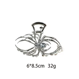 Gothic metal spider hair claw clip with rhinestones and pearls for unique styling 1pc
