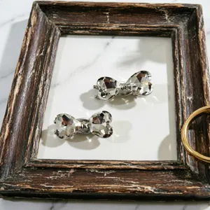 Sparkling crystal heart hair clips with silver base, elegant cute styling accessories.