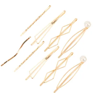 Set of elegant gold hair clips, geometric metal hairpins and pearl hair accessories for women.