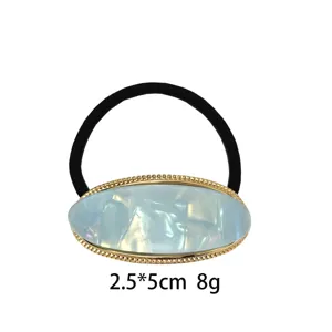 Ovale haarband met blauw hars en gouden kralenrand, elegant haarrek voor vrouwen.