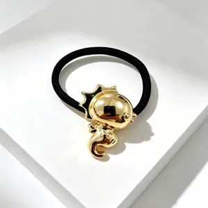 Haarband met vergulde metalen bedel, stijlvolle zwarte elastische paardenstaarthouder voor dagelijks.