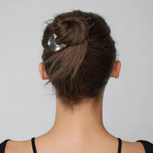Forcina per capelli a U in metallo minimalista per eleganti acconciature a chignon.