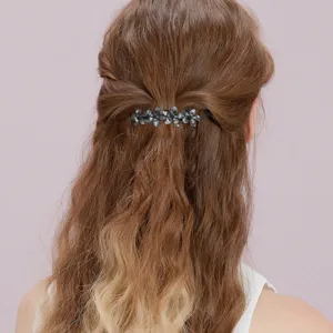 Exquisita pinza de pelo de flor de metal para peinados elegantes, accesorio de moda premium.