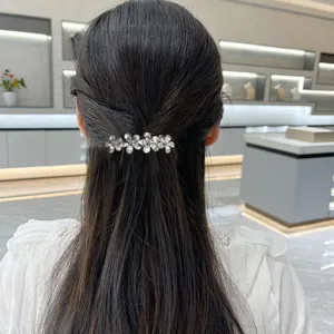 Elegante pinza de pelo de resorte con flor plateada para mujeres, accesorios franceses.