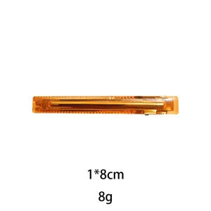 Amber transparent resin hair clip detail view, 1x8cm size and lightweight 8g daily design.