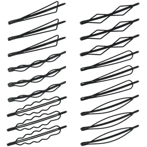 Close-up of minimalist black geometric hair clips set, showcasing diverse sleek shapes.