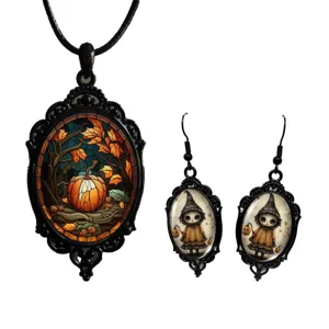 Gothic crystal glass cameo necklace and earrings set featuring vintage pumpkin and witch motifs.