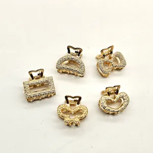 Mini gold metal hair claw clips set for women, elegant geometric hair accessories design.