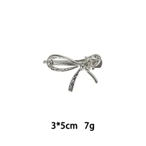 Silberne Legierung Schleife Haarklammer für Damen, elegante Haarspange, Größe 3x5cm und 7g.