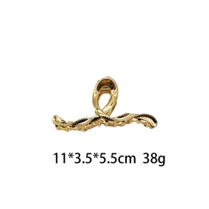 Pinza para el pelo de metal dorado diseño líquido hueco irregular accesorio chic 11cm