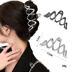 Liquid metal hair claw clip for thick hair, stylish silver geometric hair styling accessory.
