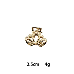 Mini gold alloy hair claw clip detail, compact 2.5cm size, elegant crown shape accessory.