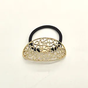 Elegant French style hollow geometric gold metal decorative hair tie with elastic black band.