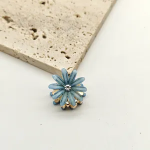 Mini blue flower hair claw clip with crystal diamond detail for sweet daily hair styling