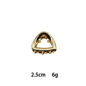Mini gold metal triangle hair claw clip detail, 2.5cm compact size for daily styling.
