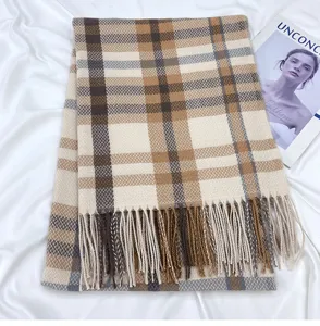 Classic plaid cashmere feel winter scarf with elegant fringe, warm and stylish daily accessory.