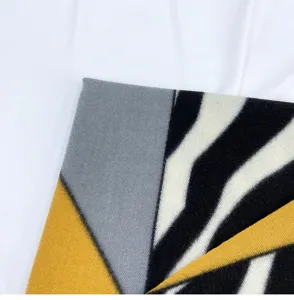 Detailed close-up view of soft imitation cashmere scarf fabric with trendy zebra print pattern.